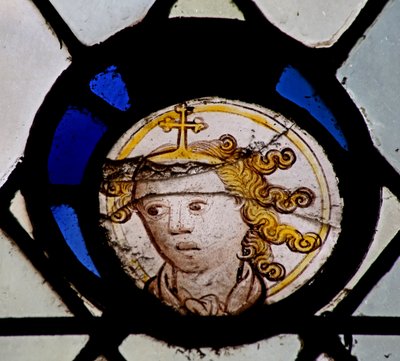 Window s6 depicting a reset head fragment by English School