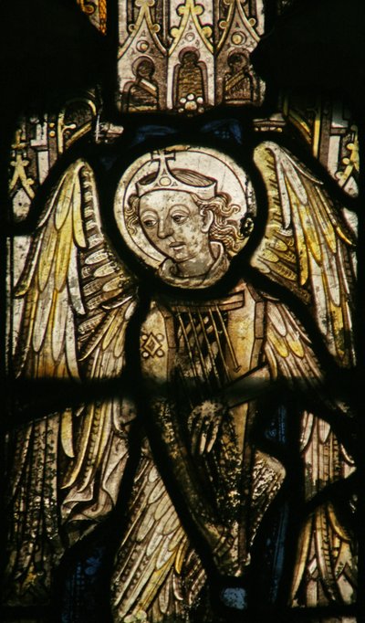 Window depicting a musician angel with a harp by English School
