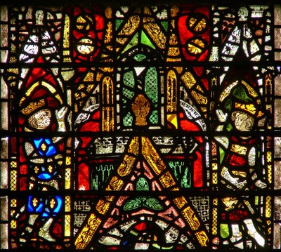 Window w42 depicting a canopy and royal side figures by English School