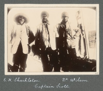 A group photograph of Shackleton, Captain Scott, and Dr Wilson on their return to Discovery from the attempt to reach the South Pole. From album by Sir Ernest Henry Shackleton entitled National Antarctic Expedition (1901-1903) by Ernest Henry Shackleton
