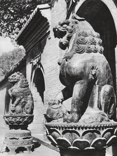 Taiyuanfu, Ta pei sze, Shansi, Bronze lions at the temple entrance by Ernst Boerschmann