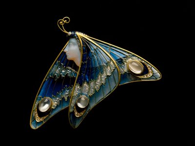 Art Nouveau: gold brooch, translucent enamel, opal, moonstone and diamond in the shape of a butterfly woman by Eugene Feuillatre