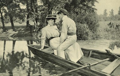 Couple of lovers in a rowing boat by European Photographer