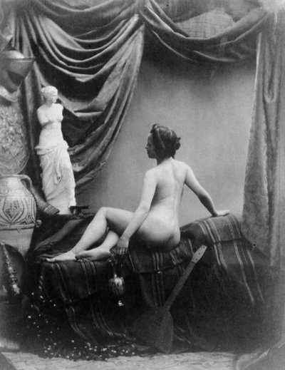 Nude Lady Admiring the Figure of the Venus de Milo by European Photographer