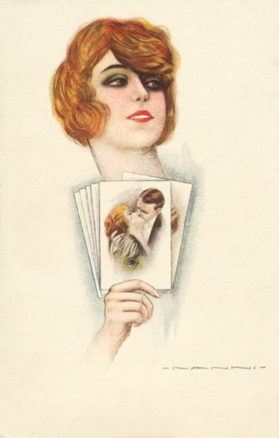 Redhead holding cards showing herself kissing a man by European School