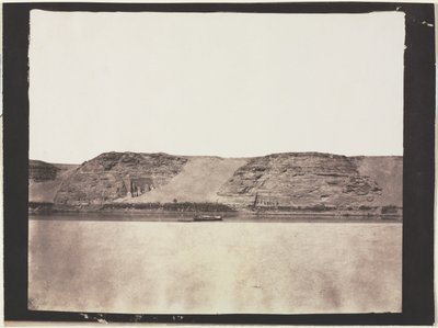 General View of Monuments Carved into Bedrock with Photographers Dahabieh. Abu Simbel by Félix Teynard