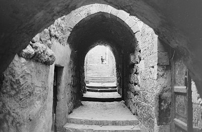 Road in the Souks of the Old City of Jerusalem by Fosco Maraini