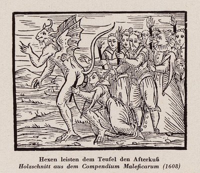 Witches kissing the devil