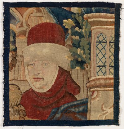 Small fragment of tapestry depicting the head of a man by Franco-Flemish School