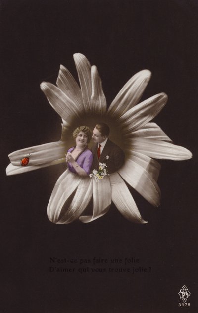 A young couple in the centre of a flower with ladybird by French Photographer