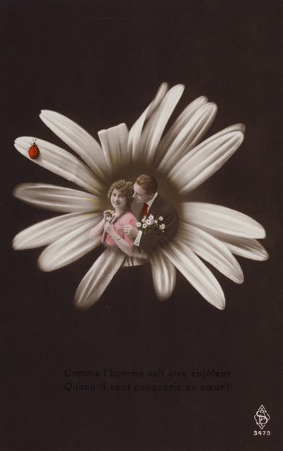 A young couple in the centre of a flower with ladybird by French Photographer