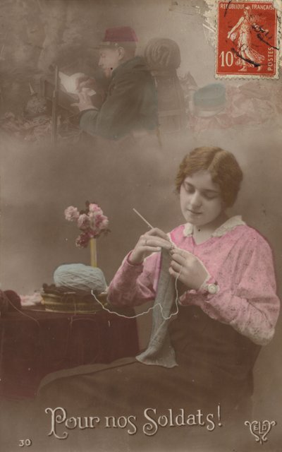 A Young Woman Knits Whilst Thinking About Her Soldier Who is Writing a Letter Home by French Photographer