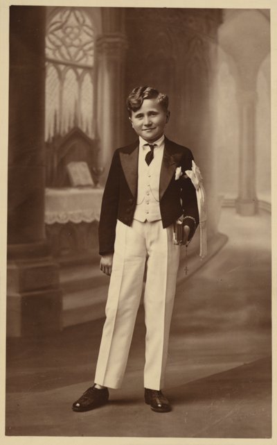 Boy Attending First Communion by French Photographer