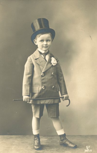Boy in Double-Breasted Suit, Wearing a Top Hat and Holding a Cane by French Photographer