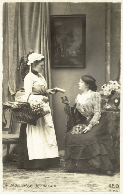 The mistress of the house giving instructions to her maid by French Photographer