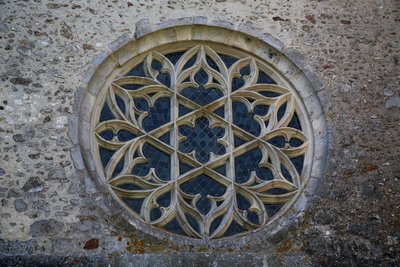 The rose window on the east wall of the south transept by French School
