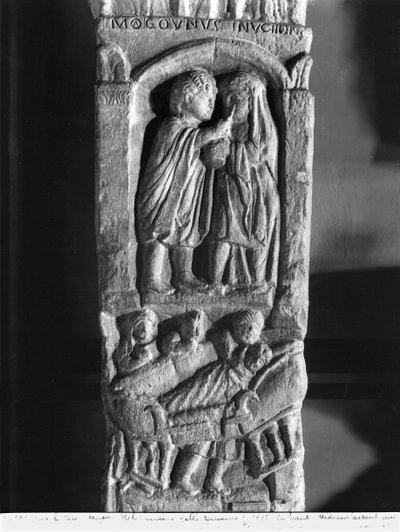 Funerary stela depicting a doctor operating on a woman