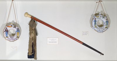 Guild and trade objects, including a walking stick and gourds by French School