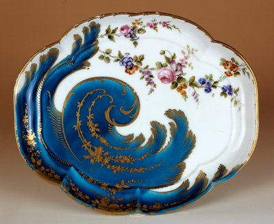 Plate with soft porcelain volutes made in the manufacture of Vincennes. 1755 Paris. Louvre Museum by French School