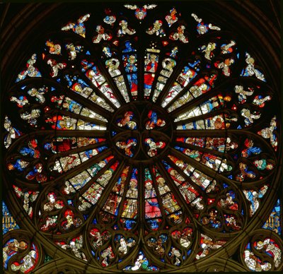 Rose window depicting the Coronation of the Virgin surrounded by angels with Instruments of the Passion and musical instruments by French School