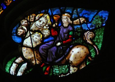 The West Rose Window Depicting a Scene from the Book of Revelation: Seven-Headed Beast Carries the Whore of Babylon with a Golden Cup in Her Hand by French School