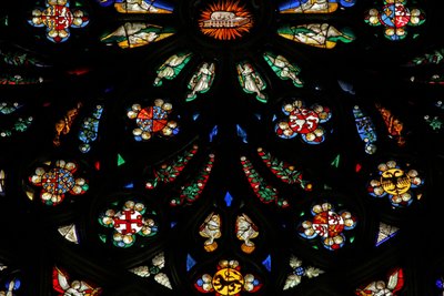 Window depicting a detail from the west rose window; the coats of arms include Montmorency-Laval, Bertrand Duguesclin and Oliver de Clisson by French School