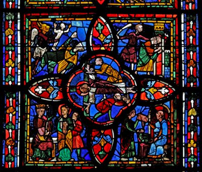 Window depicting the second section of window w7: at the centre is the crucifixion of St Peter; elsewhere is St Peter before Nero; St Peter imprisoned; the devil takes a soul by French School