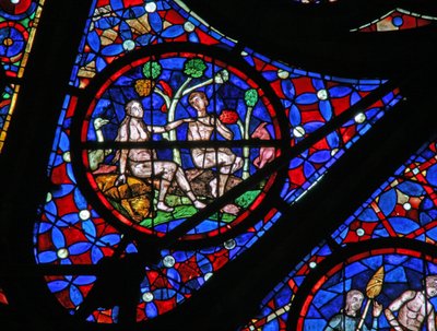Window w115 depicting Adam and Eve under a tree with animals and birds by French School