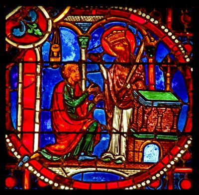 Window depicting a scene from the Theophilus story: he prays before a statue of the Virgin who then appears to him by French School