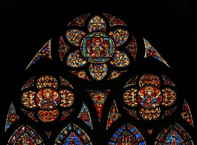 Window w201 depicting the tracery lights with three angels by French School