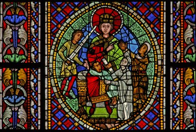 Window depicting Solomon orders the child to be cut in two - the real mother then pleads for the baby
