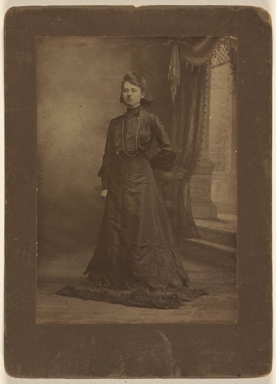 Portrait of a Young Woman in Long Black Dress, Standing by George W. Killian