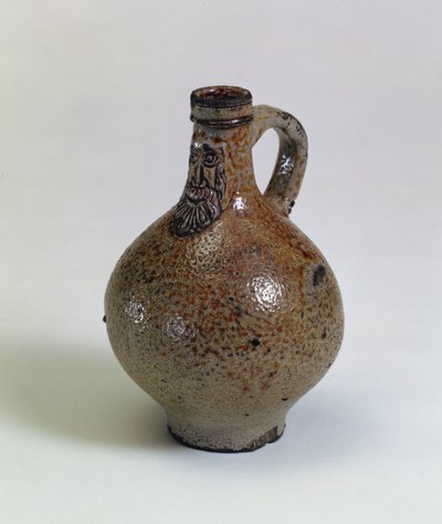 Bartmannkrug or Bellarmine wine bottle decorated with an applied bearded face mask, Germany, c.1630-40 by German School