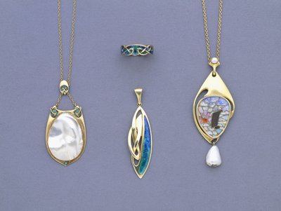 A Group of Liberty & Co Yellow Metal and Enamel Pendants and a Ring Designed by Archibald Knox by Giovanni Bigatti