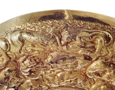 Libation bowl with embossed decorations in the shape of lions and panthers by Greek School