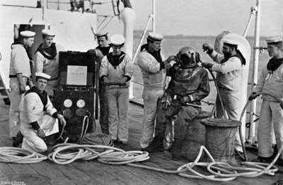Diver and His Apparatus on Board HMS Blake, 1896 by Gregory and Co