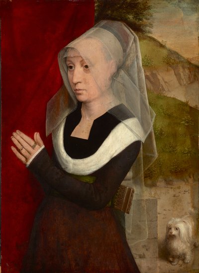 Praying woman with her dog, by Hans Memling (1433/40-1494). Oil on wood by Hans Memling