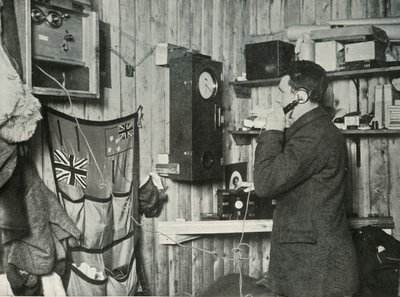 Dr. Simpson in the Hut at the Other End of the Telephone Timing the Observation by Herbert Ponting