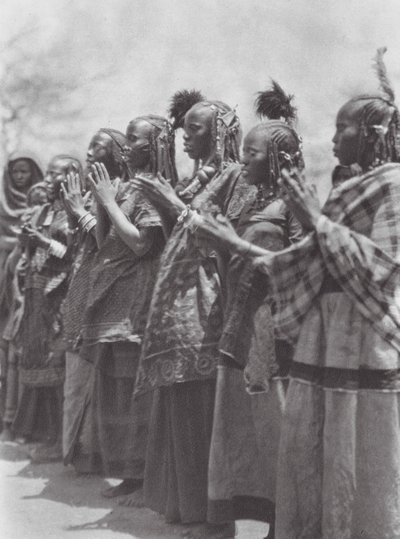 Africa: Aulad Hamid women clapping time at a dance by Hugo Adolf Bernatzik