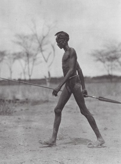 Africa: Dinka warrior with spear by Hugo Adolf Bernatzik