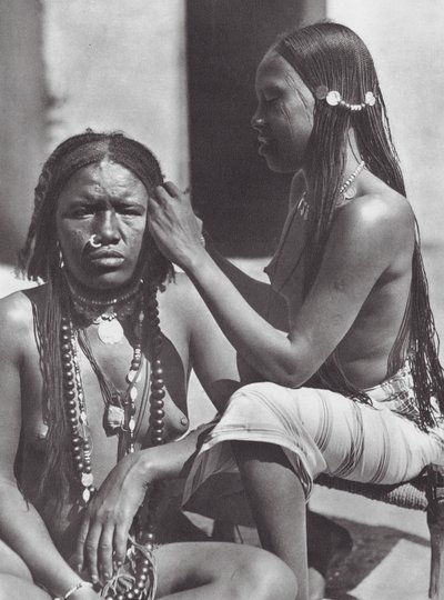 Sudanese women plaiting hair by Hugo Adolf Bernatzik