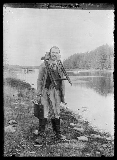 Hugo Simberg with Painting Supplies at Niemenlautta by Hugo Simberg