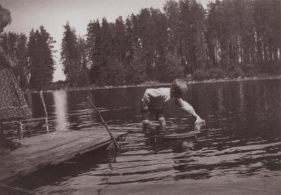 Children Floating a Toy Ship at Niemenlautta by Hugo Simberg