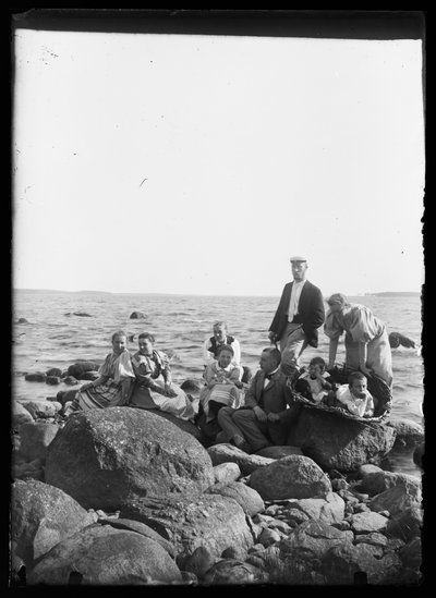 Group Photo on the Rocks of Selkäranta by Hugo Simberg