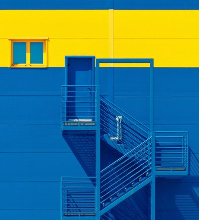 Bold Blue Yellow Facade by Igor Bakotic