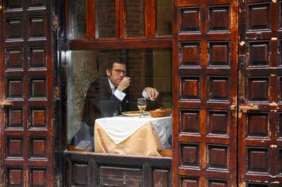 Pensive Man Cafe Window by Igor Shrayer