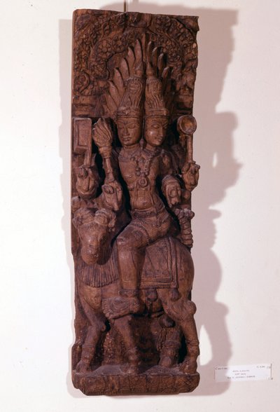Agni, god of fire, depicted with two heads on a ram, according to Hindu mythology. Wood sculpture of the 17th century. Paris, Musée Guimet by Indian School