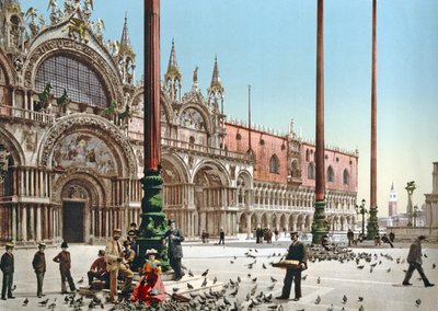 Feeding the pigeons in St Marks Square, Venice by Italian Photographer