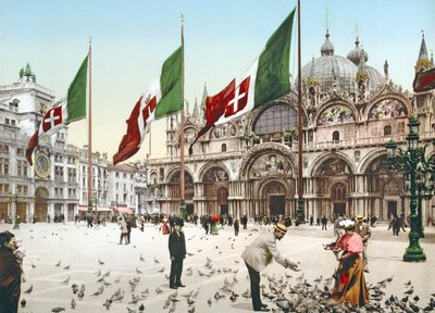 Feeding the pigeons in St Marks Square, Venice by Italian Photographer