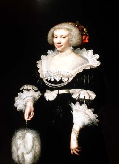 Portrait of a lady in a black dress with lace collar and cuffs by Jan Anthonisz. van Ravesteyn